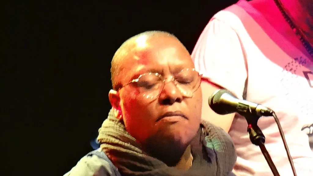 Meshell Ndegeocello performing with her eyes closed