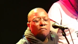 Meshell Ndegeocello performing with her eyes closed