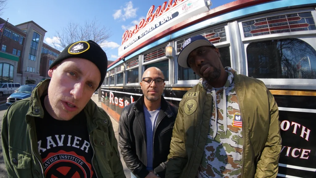 The three members of Czarface standing outside a diner in Somerville, Massachusetts